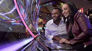 Filipino player using tttjili platform on a mobile phone to place sports bets and play slots